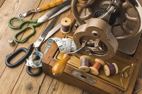 Vintage sewing machine with thread measuring tape Stock Photos