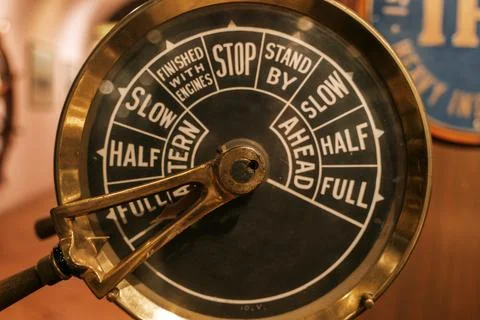 Vintage ship engine telegraph dial close-up, nautical control instrument Stock Photos