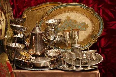 Vintage silver tableware on the table Stock Photos