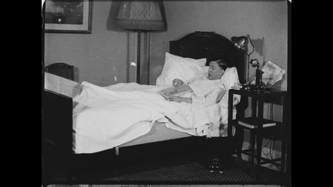 Vintage Smoking in Bed Stock Footage 129042212