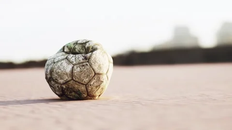 Vintage Soccer ball on sand Stock Footage