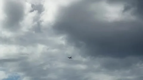Vintage Spitfire Warbird Flying Through Cloudy Sky at Gold Coast Air Show Stock Footage 345111306