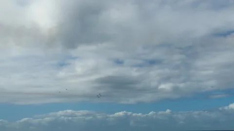 Vintage Spitfire Warbird Silhouette Flying Through Overcast Sky at Gold Coast Stock Footage 345100367