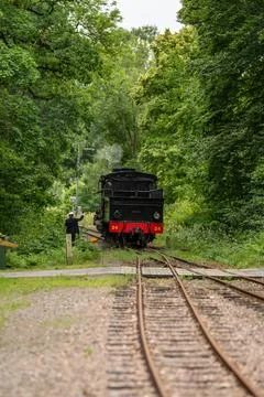 Vintage steam engine backing up Stock Photos