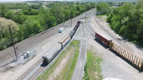 Vintage Steam Freight Train Backs Up in Yard Doing Switching Operations in .. Stock Footage 325616779