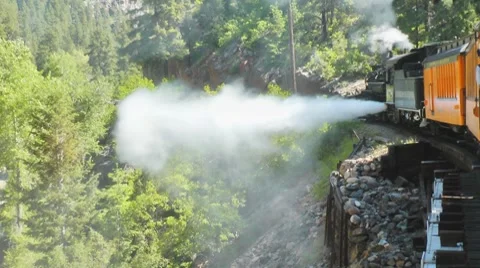 Vintage steam train on bridge Stock Footage 7761265