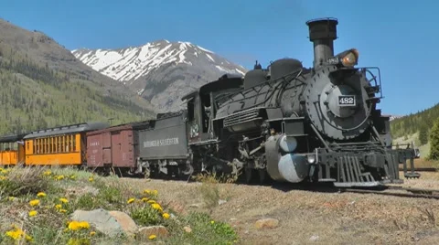 Vintage steam train passing Stock Footage 7763699