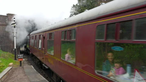 Vintage Steam Train Passing Under Bridge In Gloucester And Warwickshire Stock Footage 341500354