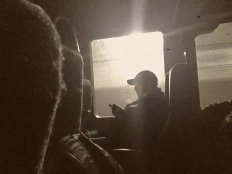 Vintage Stylized Man on Bus Checking Smartphone Stock Video Stock Footage 37787542