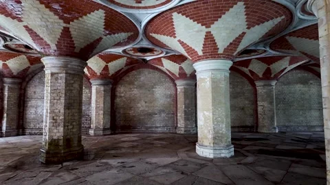 Vintage subway structure featuring intricate tiled patterns, brick walls, and Vídeos de archivo 313660403
