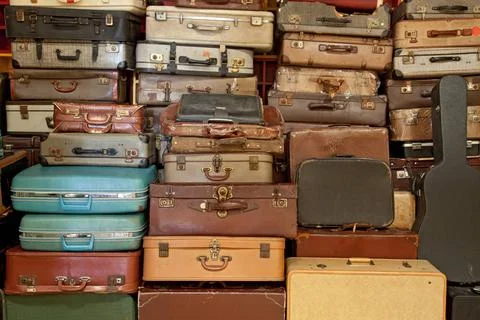 Vintage suitcase and briefcase Stack of Vintage retro suitcase and briefca... Stock Photos