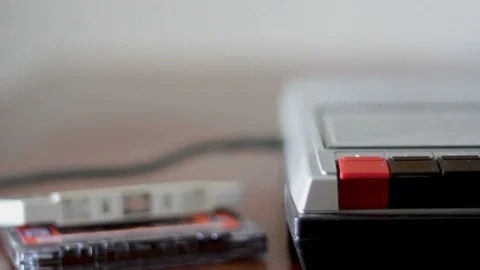 Vintage tape player/recorder: eject, insert cassette and press play Stock Footage 88333431