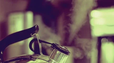 Vintage Tea Kettle - Steaming! Stock Footage 12289167