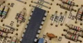Vintage Tech Old Technology Pan Circuit Electronic Board Components Background 4k or 4k+ Resolution
