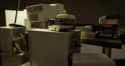 Vintage technology collection in a dimly lit creative workspace Stock Footage 325072027
