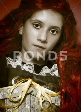 Vintage teen, young with long red hair Stock Photos