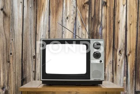 Vintage Television With Rustic Wood Wall And Cut Out Screen