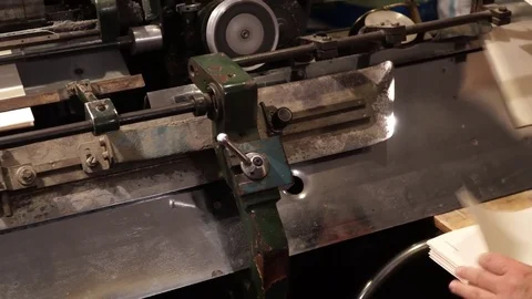 Vintage thread book sewing machine work – how to print book in old style technol Stock Footage 82728657