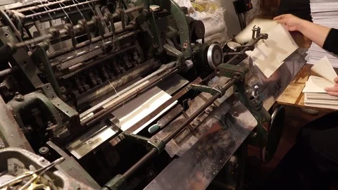 Vintage thread book sewing machine work – how to print book in old style technol Stock Footage 82729377