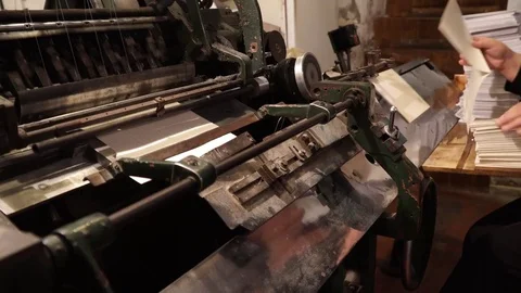 Vintage thread book sewing machine work – how to print book in old style technol Stock Footage 82729606