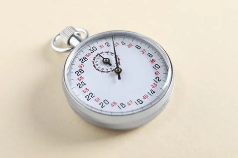 Vintage timer on beige background. Measuring tool Foto stock