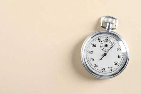 Vintage timer on beige background, top view with space for text. Measuring to Stock Photos