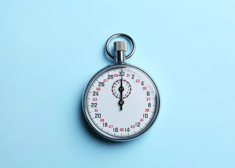 Vintage timer on light blue background, top view Foto stock