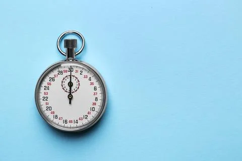 Vintage timer on light blue background, top view. Space for text Foto stock