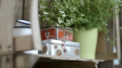 Vintage Tin Boxes Decorates a Kitchen Shelf Stock Footage 106082312