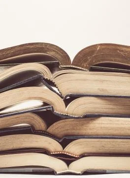 Vintage tone of Composition with stack of books on white background Stock Photos