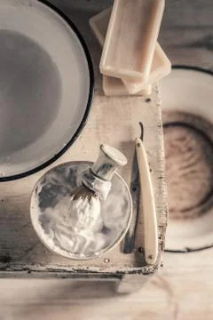 Vintage tools for shave. Sharp razor, soap and brush Stock Photos