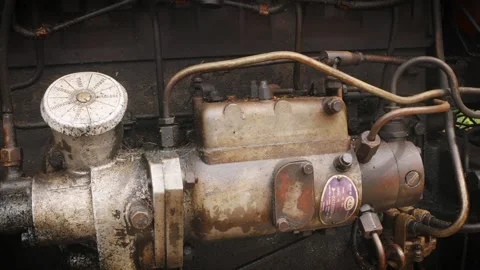 Vintage tractor engine close up panning camera movement stock footage Vídeos de archivo 314564751