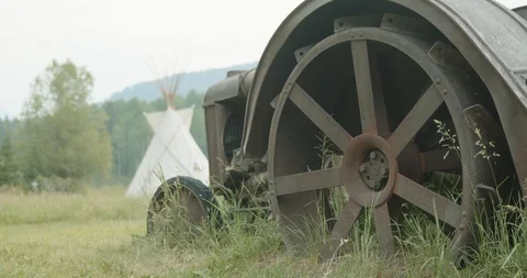 Vintage tractor in a field Stock Footage 92770264