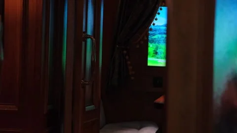 A vintage train compartment. Window view from a train traveling across the Stock-Footage 302718407