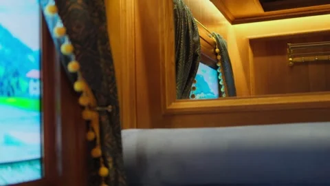 A vintage train compartment. Window view from a train traveling across the Stock Footage 303016074