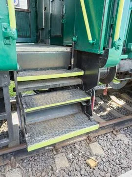 Vintage train steps for safe boarding, sturdy metallic construction, textur.. 库存照片