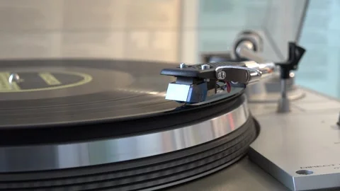 Vintage Turntable Playing Vinyl Record in Home Setting, with various arm mov Stock Footage 293086955