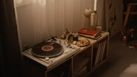 Vintage Turntable Playing Vinyl Record for Romantic Evening Stock-Footage 345205257