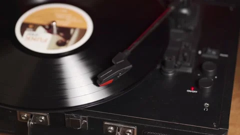 Vintage turntable plays the record Stock Footage 146308738