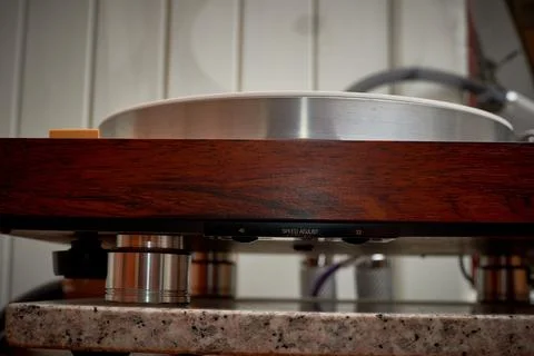 Vintage Turntable Setup on a Wooden Surface in a Cozy Music Studio During L.. Stock Photos