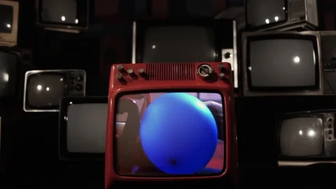 Vintage TV Explodes With Man Inflating Blue Balloon on Screen - Close Up 스톡 동영상 117571976