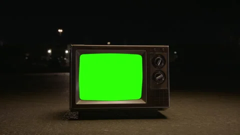 Vintage TV in Middle of Road Green Screen Slow Dolly Stock Footage