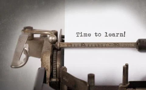 Vintage typewriter - Time to learn Stock Photos