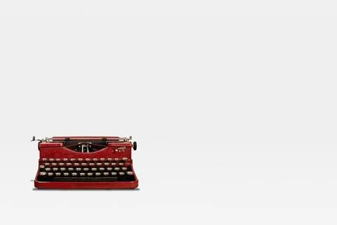 Vintage typewriter on white flat background Stock Photos