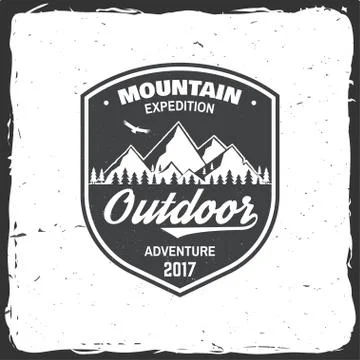 Vintage typography design with soaring eagle and mountain silhouette. 스톡 일러스트