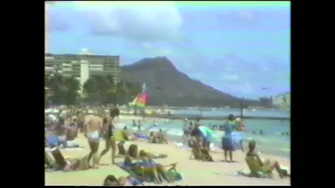 Vintage VHS 1980 People Hanging Out on Beach in Hawaii Stock Footage