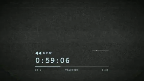 Vintage VHS Rewind Effect with Digital Timer and Analog Glitch on Dark Textured Stock Footage 345761523