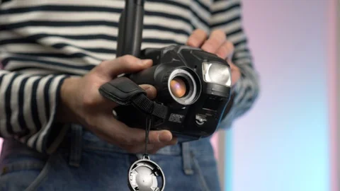 Vintage VHS Video Camera Being Used To Film By a Hipster Stock Footage 103800976