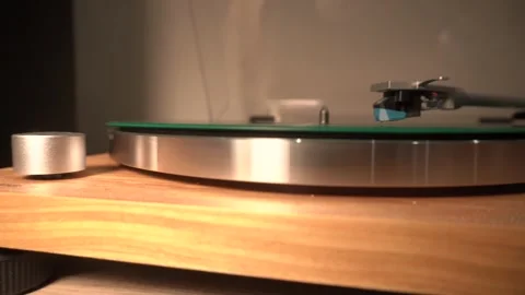 The vintage vinyl record is spinning. the needle moves smoothly along the plate. Stock Footage 321643653