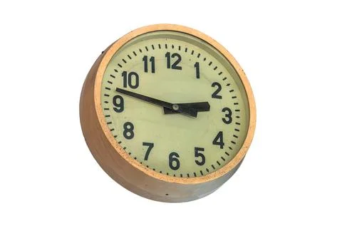 Vintage wall clock on white background, circular design with cream face, bl.. Stock Photos